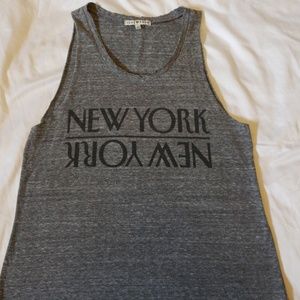 Junk food muscle shirt. Distressed neck. Size S